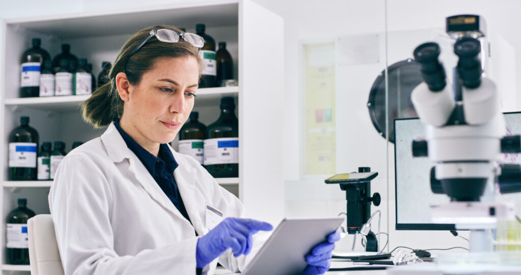 Medication to regain control over your drinking 2 Shot of a young woman using a digital tablet while working in a lab